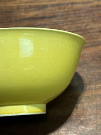 A pair of Chinese yellow-glazed bowls, Yongzheng mark, 19th C.