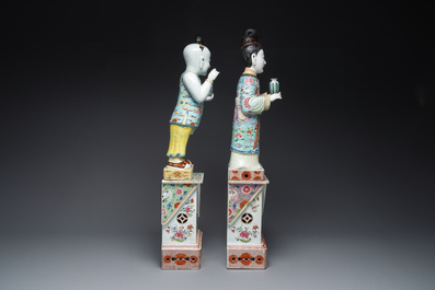 A pair of large Chinese famille rose figures on stands, Qianlong