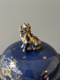 A Chinese gilt-decorated powder-blue vase with a phoenix among blossoming branches, Qianlong