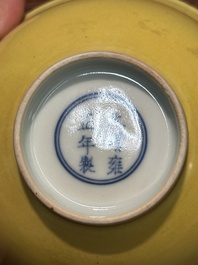 A pair of Chinese yellow-glazed bowls, Yongzheng mark, 19th C.