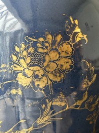 A Chinese gilt-decorated powder-blue vase with a phoenix among blossoming branches, Qianlong