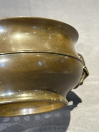 A Chinese bronze elephant-head-handled censer, Wan Shou Wu Jiang 萬壽無疆 mark, 19th C.