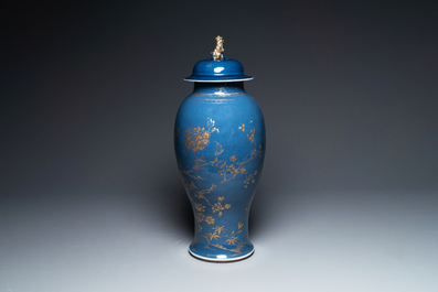 A Chinese gilt-decorated powder-blue vase with a phoenix among blossoming branches, Qianlong