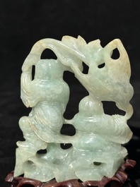 A Chinese jade 'He He Er Xian' group on wooden stand, 19th C.