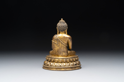 A fine Sino-Tibetan gilt bronze Buddha, 15/16th C.