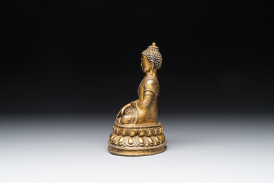 A fine Sino-Tibetan gilt bronze Buddha, 15/16th C.