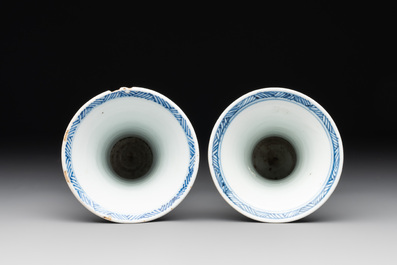 A Chinese blue and white garniture with five vases, Kangxi