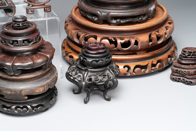 A collection of 55 Chinese wooden stands, 19/20th C.