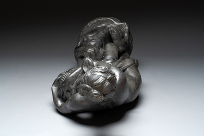 A lead sculpture of a lady pouring water, 19th C.