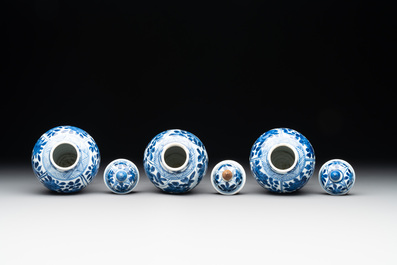 A Chinese blue and white garniture with five vases, Kangxi