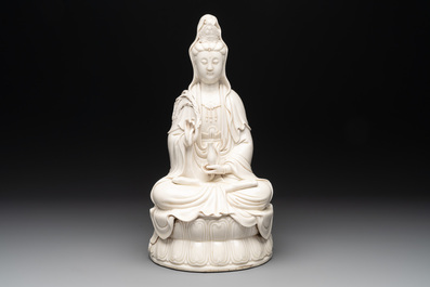 A Chinese Dehua blanc de Chine Guanyin seated on a lotus throne, 20th C.