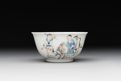 A Chinese blue-enamelled gilt-decorated grisaille cup and saucer, Yongzheng
