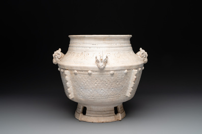 A Chinese archaistic white-glazed vase on wooden stand, Qing
