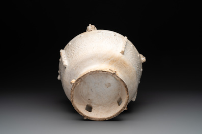 A Chinese archaistic white-glazed vase on wooden stand, Qing