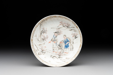 A Chinese blue-enamelled gilt-decorated grisaille cup and saucer, Yongzheng