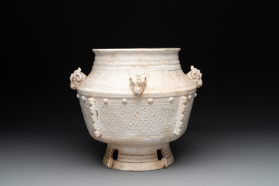 A Chinese archaistic white-glazed vase on wooden stand, Qing