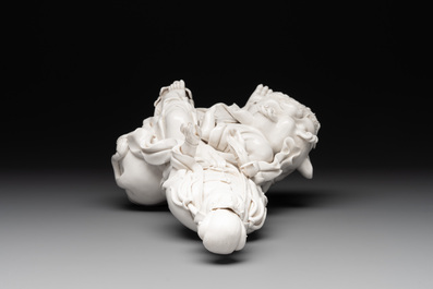A Chinese Dehua blanc de Chine Guanyin seated on a lion, 20th C.