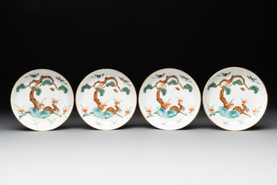 Four Chinese famille rose 'monkey and deer' saucers, Tongzhi mark and of the period