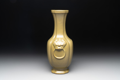 A Chinese teadust-glazed 'hu' vase with 'taotie' design, 19/20th C.