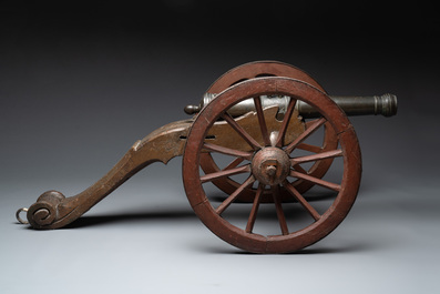 A Dutch bronze saluting cannon on a partly original carriage, inscribed C. Ouderogge Fecit, Rotterdam, dated 1641