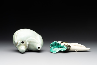 A Chinese celadon-glazed water dropper, a yellow-glazed ewer, a famille noire covered vase and a miniature model, 19th C.