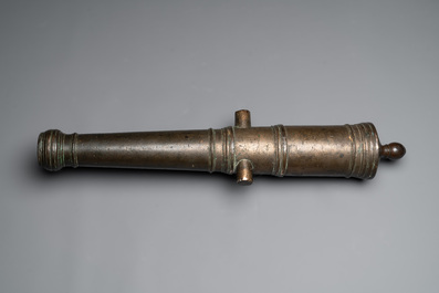 A Dutch bronze saluting cannon on a partly original carriage, inscribed C. Ouderogge Fecit, Rotterdam, dated 1641