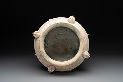 A Chinese archaistic white-glazed vase on wooden stand, Qing