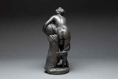 A lead sculpture of a lady pouring water, 19th C.