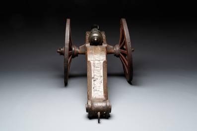 A Dutch bronze saluting cannon on a partly original carriage, inscribed C. Ouderogge Fecit, Rotterdam, dated 1641