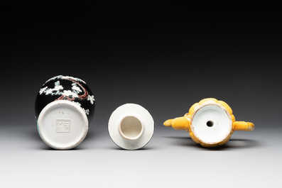 A Chinese celadon-glazed water dropper, a yellow-glazed ewer, a famille noire covered vase and a miniature model, 19th C.