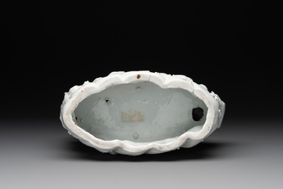 A Chinese Dehua blanc de Chine group of four deities on a boat, Republic