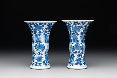 A Chinese blue and white garniture with five vases, Kangxi
