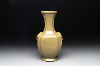 A Chinese teadust-glazed 'hu' vase with 'taotie' design, 19/20th C.
