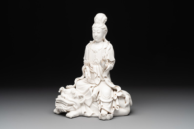 A Chinese Dehua blanc de Chine Guanyin seated on a lion, 20th C.