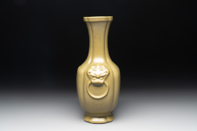 A Chinese teadust-glazed 'hu' vase with 'taotie' design, 19/20th C.
