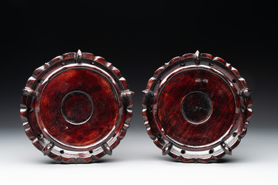Two Chinese eggshell famille rose 'dragon' bowls on wooden stands, Qianlong mark, 20th C.