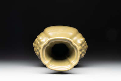 A Chinese teadust-glazed 'hu' vase with 'taotie' design, 19/20th C.