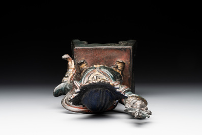 A Chinese gilt-lacquered bronze guardian, Ming