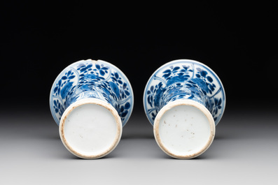 A Chinese blue and white garniture with five vases, Kangxi