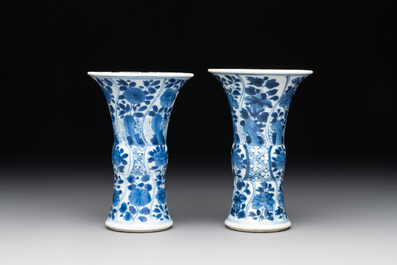 A Chinese blue and white garniture with five vases, Kangxi