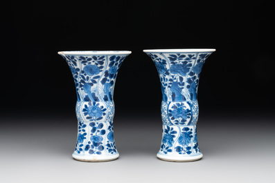 A Chinese blue and white garniture with five vases, Kangxi