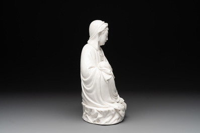 A Chinese Dehua blanc de Chine figure of a seated Guanyin on wooden stand, 19/20th C.