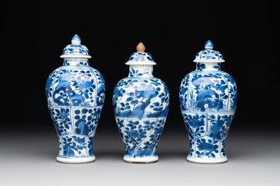 A Chinese blue and white garniture with five vases, Kangxi