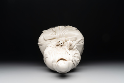 A Chinese Dehua blanc de Chine Guanyin seated on a lotus throne, 20th C.