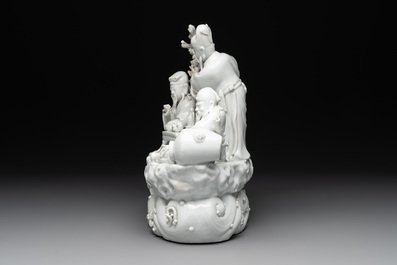 A Chinese Dehua blanc de Chine group of four deities on a boat, Republic