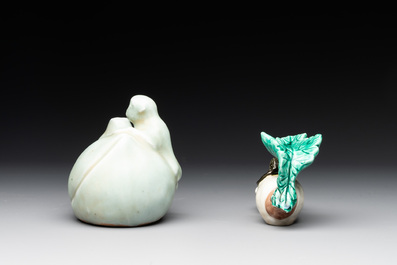 A Chinese celadon-glazed water dropper, a yellow-glazed ewer, a famille noire covered vase and a miniature model, 19th C.