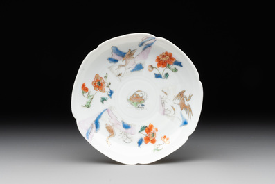 A Chinese polychrome-decorated cup and saucer with ducks and flowers, Yongzheng