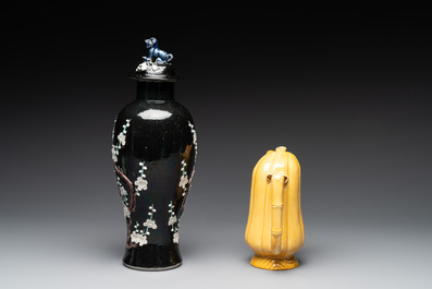 A Chinese celadon-glazed water dropper, a yellow-glazed ewer, a famille noire covered vase and a miniature model, 19th C.