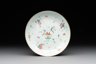 A Chinese famille rose bowl, a plate and a blue and white vase, Tongzhi mark and of the period