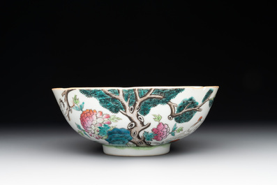A Chinese famille rose bowl, a plate and a blue and white vase, Tongzhi mark and of the period